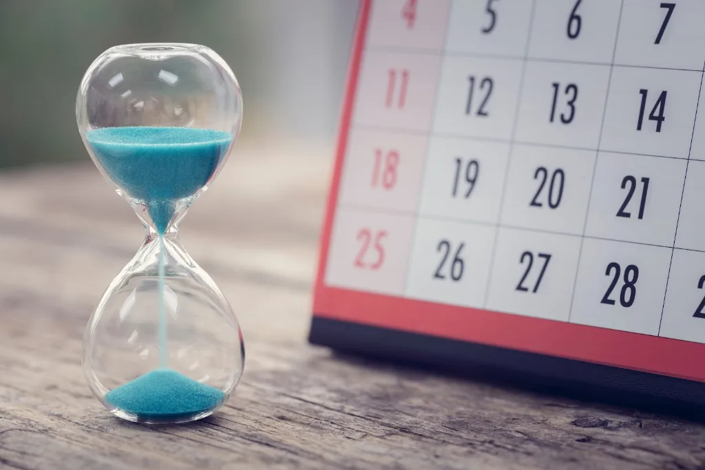 Hourglass and calendar marking the November mortgage license renewal window