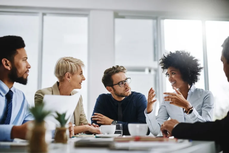 Mortgage brokerage team reviewing how NMLS renewal issues affect operations
